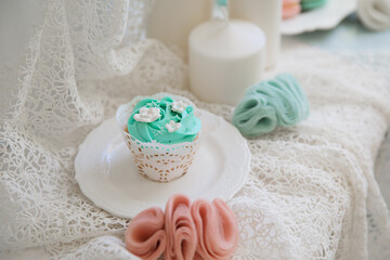 Obraz na płótnie Canvas turquoise cupcake. beautiful desserts for decoration and celebration. 