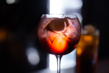 glass of red wine on black background