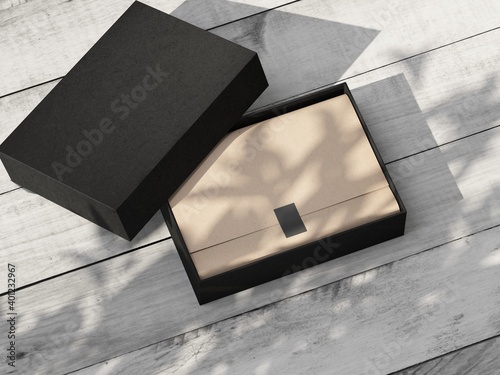 Download Opened Black Textured Gift Box Mockup With Kraft Wrapping Paper And Sticker On The White Wooden Table Outdoor 3d Rendering Wall Mural Customdesigner
