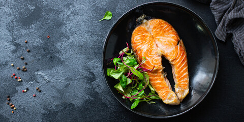 salmon fried fish in a plate grilled seafood omega vitamin ready to cook and eat on the table for healthy meal snack outdoor top view copy space for text food background rustic image pescetarian diet