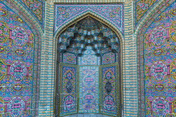 Colorful mosaic  patterns on the wall of Nasir Al-Mulk Mosque (Pink Mosque) in Shiraz, Iran