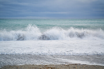 waves breaking wildly on a stormy day in Nerja, Andalucía