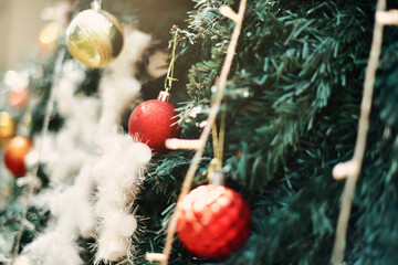 Christmas toy on green tree Holiday festive background