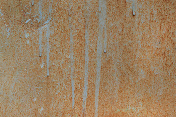 Surface with old paint. Dried paint drops, cracking.