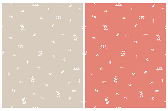 Seamless Hand Drawn Vector Patterns Set. White Irregular Daubs and Spots Isolated on a Beige and Pale Red Background. Cute Abstract Doodle Print ideal for Fabric. Scribles Made with Brushes.