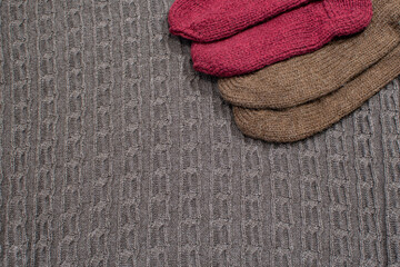 Fototapeta na wymiar Texture of wool knits in brown and red tones
