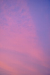 Abstract blurred pink purple and blue gradient colorful clouds and sky sunset on evening nature background.