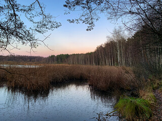 Winter sundown at ponds in Myszkow Poland.