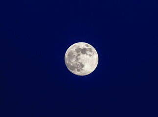 Obraz premium Full moon on the background of the night sky in winter