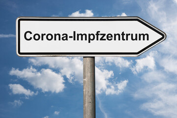 Obraz premium Wegweiser Corona Impfzentrum
