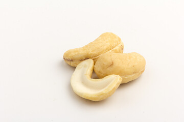 Raw cashew nuts isolated on white background.