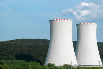 Two chimneys of nuclear power plant near the road. 