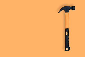 Hammer on an orange background. Hammer seamless pattern.