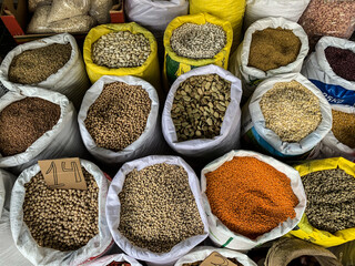Various spices in bags on the market. Netanya, Israel