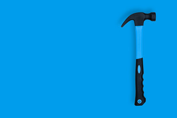 Hammer on a blue background. Hammer seamless pattern.