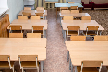  board, cafe, campus, chair, class, college, desk, education, empty, furniture, indoors, interior, knowledge, learn, lesson, meeting, modern, n desks without students in the classroom