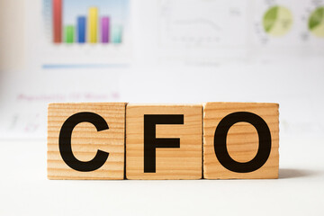 a word CFO on wooden cubes. business concept. business and Finance