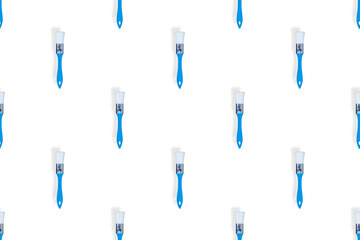 Construction brushes on a white background. Seamless texture from construction brushes.
