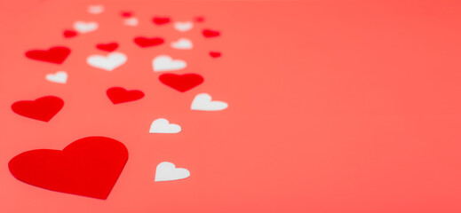 Hearts on a red background. Background for Valentine's Day, place for text.