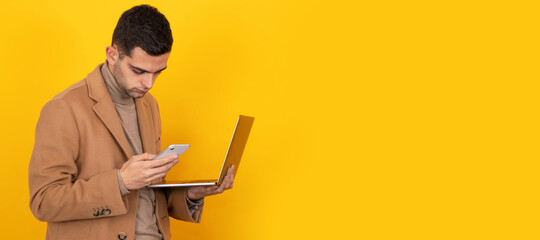 man with mobile phone and computer isolated