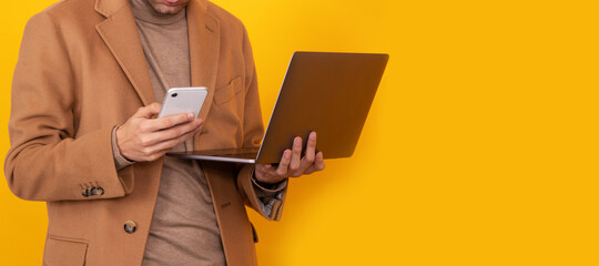 man with mobile phone and computer isolated