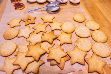 Freshly baked peanut butter cookies on cooling rack. Macro with extremely shallow dof. Selective focus limited to center of closest cookie.