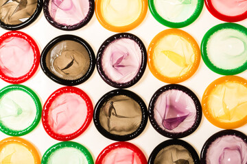 Colorful condoms background.