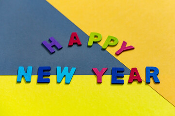 Happy new year font art colorful texting for greeting or celebrate card with colorful background, Sensitive Focus