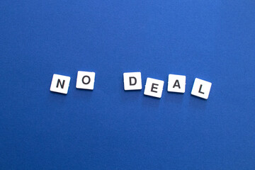 Text NO DEAL written on blue background. No deal between european union and united kingdom after brexit. Background for deadline brexit and nod-deal. Time to UK Brexit from UE. Business deal