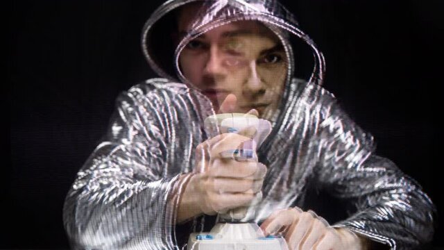 Young man playing video game