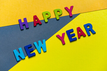 Happy new year font art colorful texting for greeting or celebrate card with colorful background, Sensitive Focus