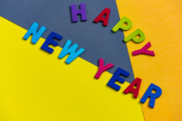 Happy new year font art colorful texting for greeting or celebrate card with colorful background, Sensitive Focus
