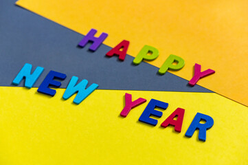 Happy new year font art colorful texting for greeting or celebrate card with colorful background, Sensitive Focus