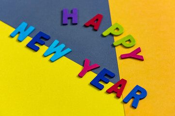Happy new year font art colorful texting for greeting or celebrate card with colorful background, Sensitive Focus