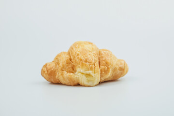 Plain croissant on white background