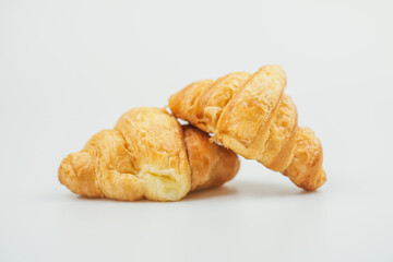 Plain croissant on white background