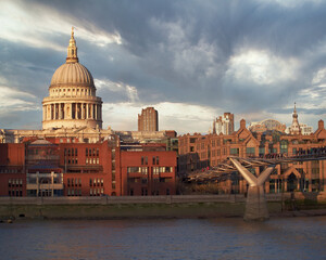 Fototapeta premium St Paul's cathedral and Millennium Bridge under impressive sky, London UK