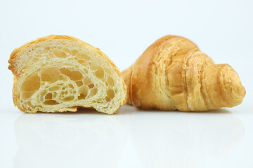 Plain croissant on white background