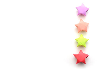 Four lucky origami stars on row