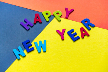 Happy new year font art colorful texting for greeting or celebrate card with colorful background, Sensitive Focus