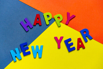 Happy new year font art colorful texting for greeting or celebrate card with colorful background, Sensitive Focus