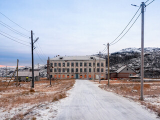 Authentic village of Teriberka in the North of Russia. The building of an old abandoned school...