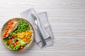 Healthy chicken breast with salad