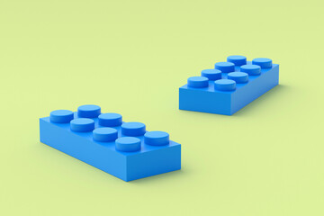 Naklejka premium Blue plastic toy blocks on yellow background. Rectangular shape constructor for development child. Bricks for education in preschool. Parts for constructor. 3d rendering