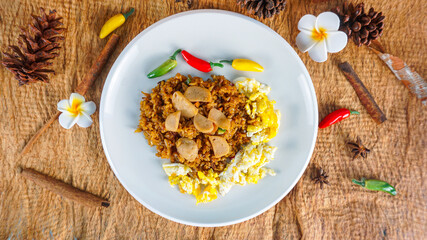 Indonesian cuisine. Fried rice with slice meatballs. Top view