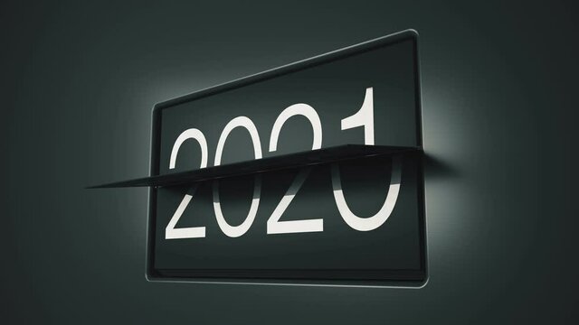 Video animation of a flip clock calendar rotates slowly from the year 2020 to 2021. Happy New Year - concept of the turn of the year