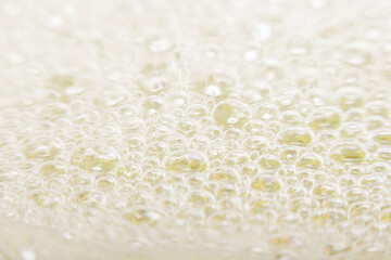 Blurred abstract bright background with bubbles. The concept is summer, soft drinks, freshness. For the backing of a site or mobile application.