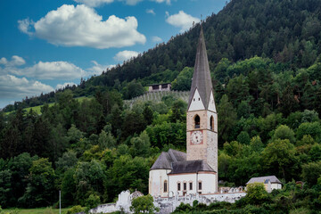 Fototapeta na wymiar The beautiful Church of San Giorgio in Agumes, South Tyrol, Italy