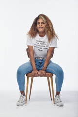 Young woman sitting on chair