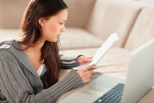 Woman reading paperwork